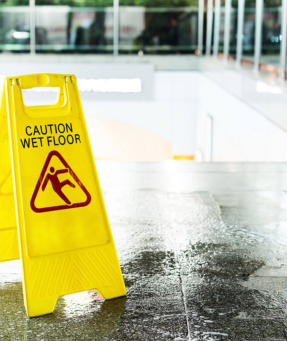 Wet floor with a sign that read "Caution wet Floor"